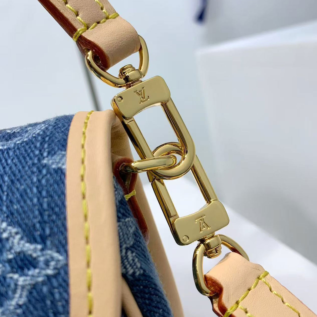 LV retro washed denim vintage flower stick armpit bag
